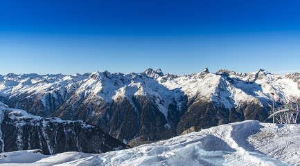 Naklejka premium Panorama of the Alpine mountains in the evening at the ski resort of Ischgl, Austria.