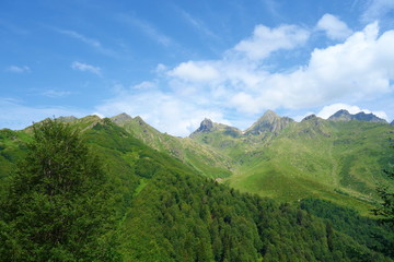 Fototapeta na wymiar View at Tsashkibuli mountain pass in Caucasus Mountains on a hiking trail leading to Silver lakes in Georgia