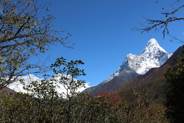 Wonderful view of mountain Ama Dablam in the Mount Everest range, iconic peak of Everest trekking...