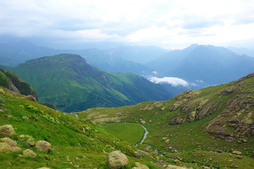 Fototapeta na wymiar Hiking trail leading to Tobavarchkhili pass in Caucasus Mountains in Georgia on a hike to Silver Lakes