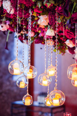 wedding banquet decoration with candles and flowers