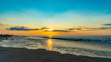 Sunset on the beach on north side of the Provincelands Cape Cod, Atlantic ocean view MA US.