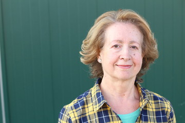 Fifty years old woman close up with copy space