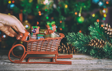 Christmas home decoration with small gifts christmas tree branch of the box with gifts