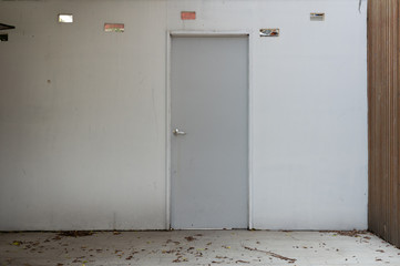 sidewalk by street wall & door