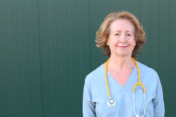 Sixty years old healthcare worker close up