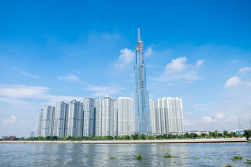 Fototapeta premium Panoramic view of Landmark 81 from the river - a new iconic skycrapper of Ho Chi Minh City, Vietnam
