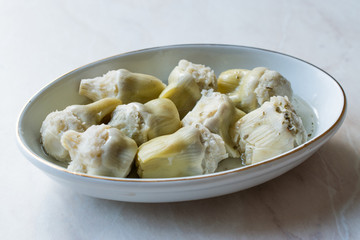 Pickled Artichoke Hearts Pickle Marinated in Plate.