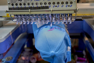 Embroidery Machine making baseball caps 