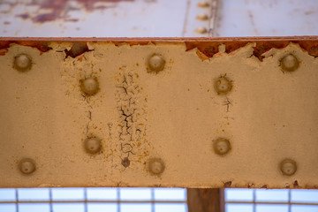 Cracked metal construction with rust