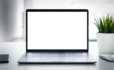 Fototapeta Laptop with blank screen on table obraz