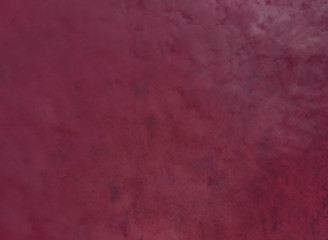 Clouds reflected in pink water of salt lake. Spain