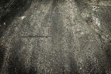 Dark stone asphalt with grimey rustic filth.