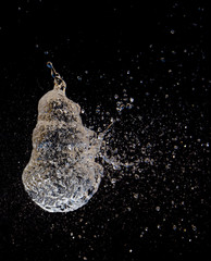 Bursting a balloon filled in with water