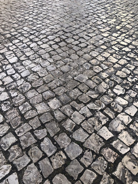Close-up of a cobbled street, Lisbon, Portugal
