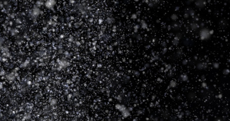 Snowfall on a black background
