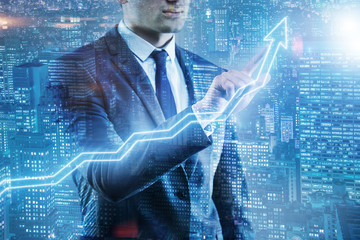 BUsinessman pressing virtual button on diagram chart