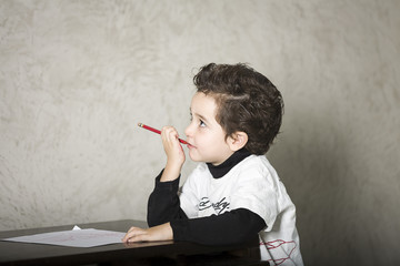 Toddler with Pencil in Mouth