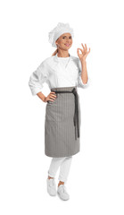 Female chef in apron showing perfect sign on white background