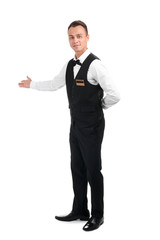 Full length portrait of young waiter in uniform on white background