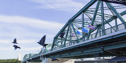 Obraz premium Phra Phuttha Yodfa Bridge, Memorial Bridge in Thailand.Morning light cloudy and blue sky.Copy right and panorama.