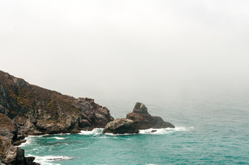 Fototapeta na wymiar Rocky Fog Shrouded Calfornia Coastline