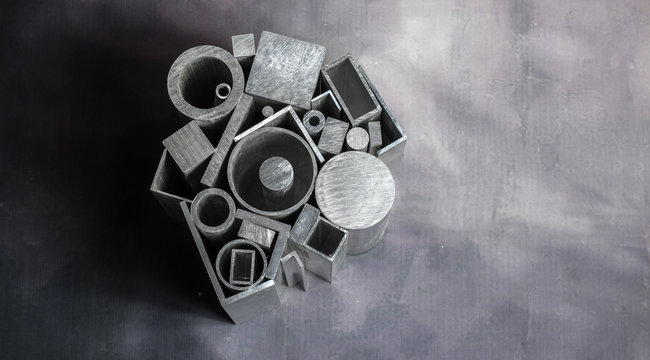 Different metal profiles on gray background