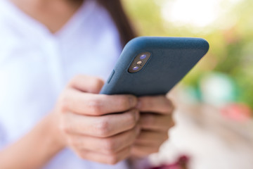 Woman use of cellphone in the city