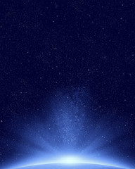 Planet Earth with appearing sunlight on night sky and stars background