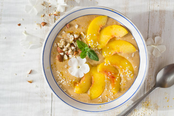 Smoothie with peach, nuts, sesame 