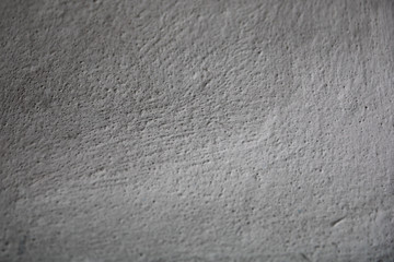 Gray spotted a concrete wall, background, texture