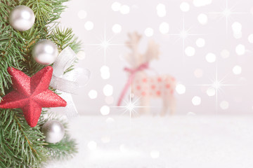 Christmas decorated fir branches with blurred background