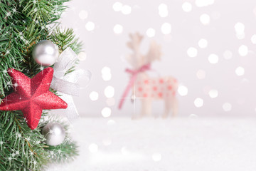 Christmas decorated fir branches with blurred background