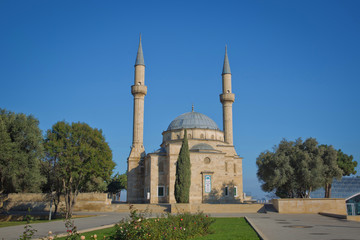 Fototapeta na wymiar Martyrdom Mosque is a gift to the Azerbaijani brothers of the Anatolian Turks. Mosque with two minarets in Baku, Azerbaijan