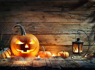 Foto op Plexiglas Halloween Pumpkins In Rustic Background With Lantern   © Romolo Tavani