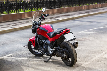 Fototapeta premium red motorcycle at the Parking lot