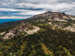 Fototapeta premium Sheregesh, Kemerovo, Russia, Aerial view drone mountains and forest, ski resort