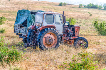 Naklejka premium Agrimotor and trug abandoned 