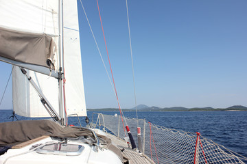 Sailboat In Blue Water