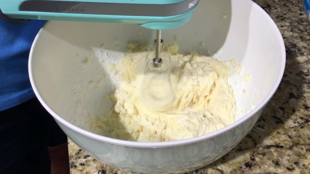 Using a hand mixer to make homemade icing