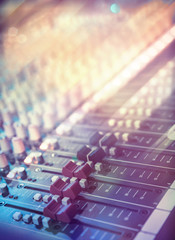 Audio sound mixer - Closeup on a sliders of a mixing console