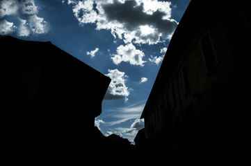 the sky is cloudy over the buildings