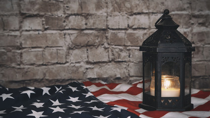 Flag of the United States and lighted candles, background