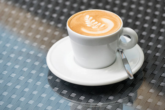 Cup of coffee on the table.