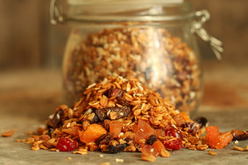 granola - sweet oat flakes with dried fruits. food background. top view. copy space