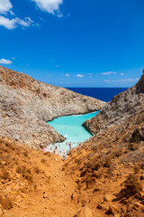 Beautiful  view on the exotic Stefanou beach (Seitan Limania) Akrotiri. Rocky beach with white sand and azure water. Spectacular natural landscape. Island of Crete. Greece