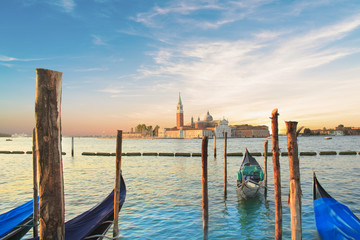 Beautiful view of the gondolas and the Cathedral of San Giorgio Maggiore, on an island in the Venetian lagoon, Venice, Italy