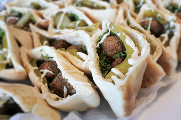Falafel in pita bread served on a party table