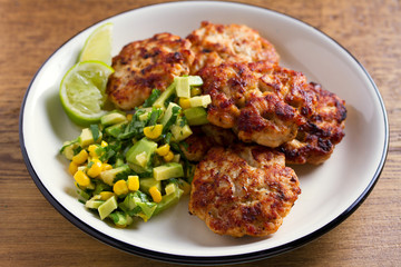 Chicken patties or  burgers with avocado corn salsa