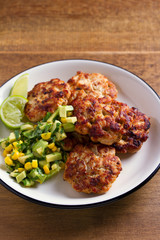Chicken patties or  burgers with avocado corn salsa